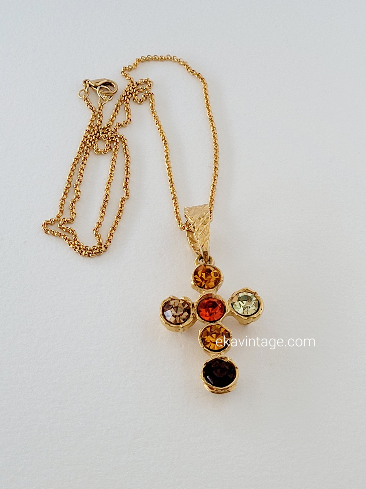 Pendentif vintage Christian Lacroix en forme de croix