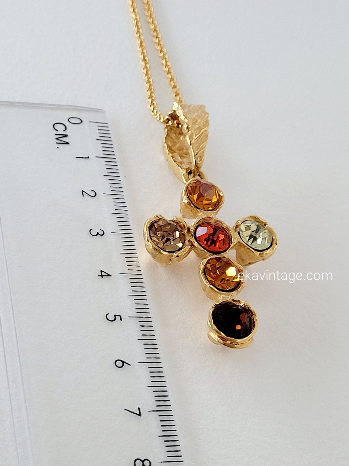 Pendentif vintage Christian Lacroix en forme de croix