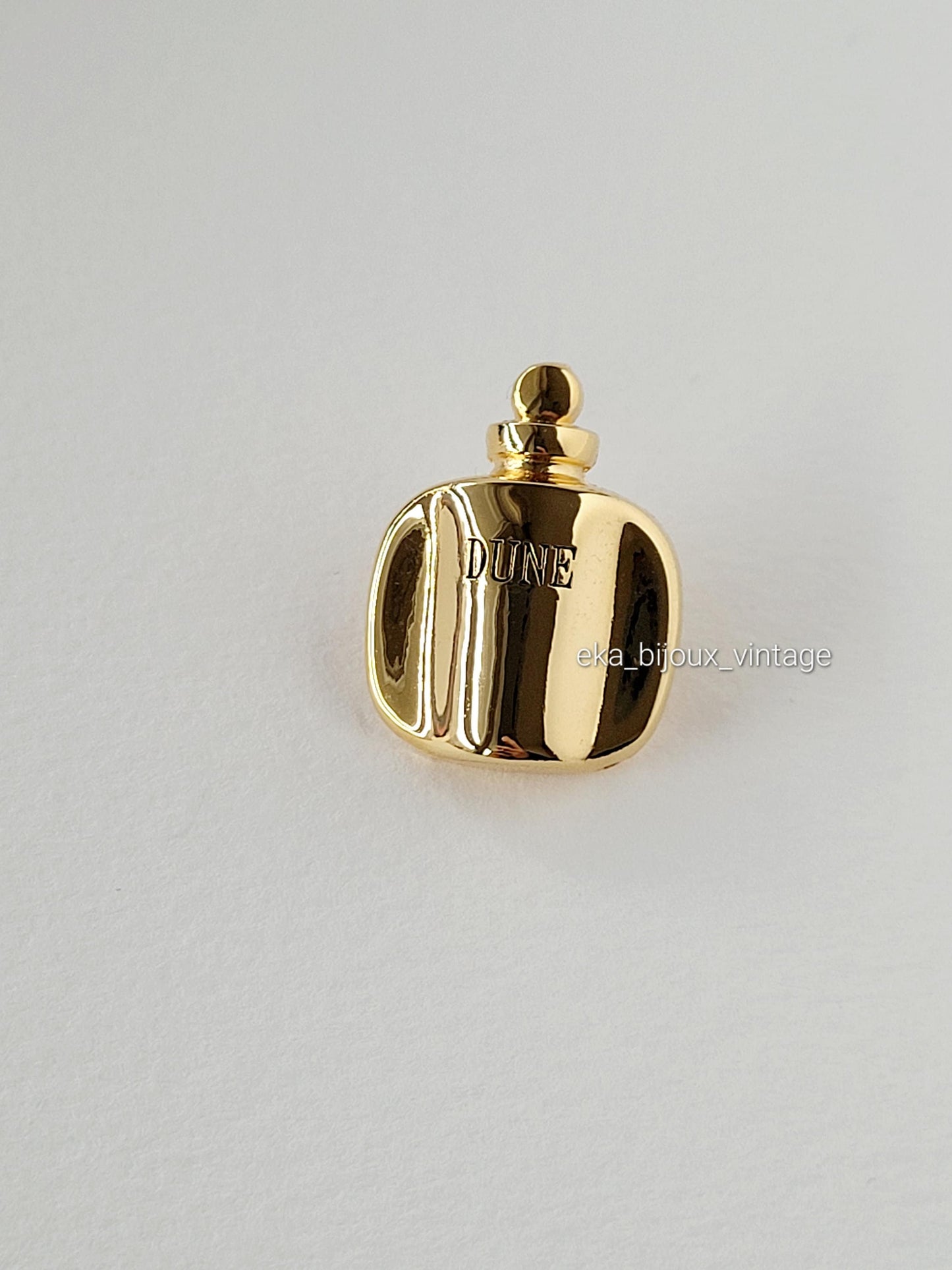 Christian Dior - Pin's vintage Dune