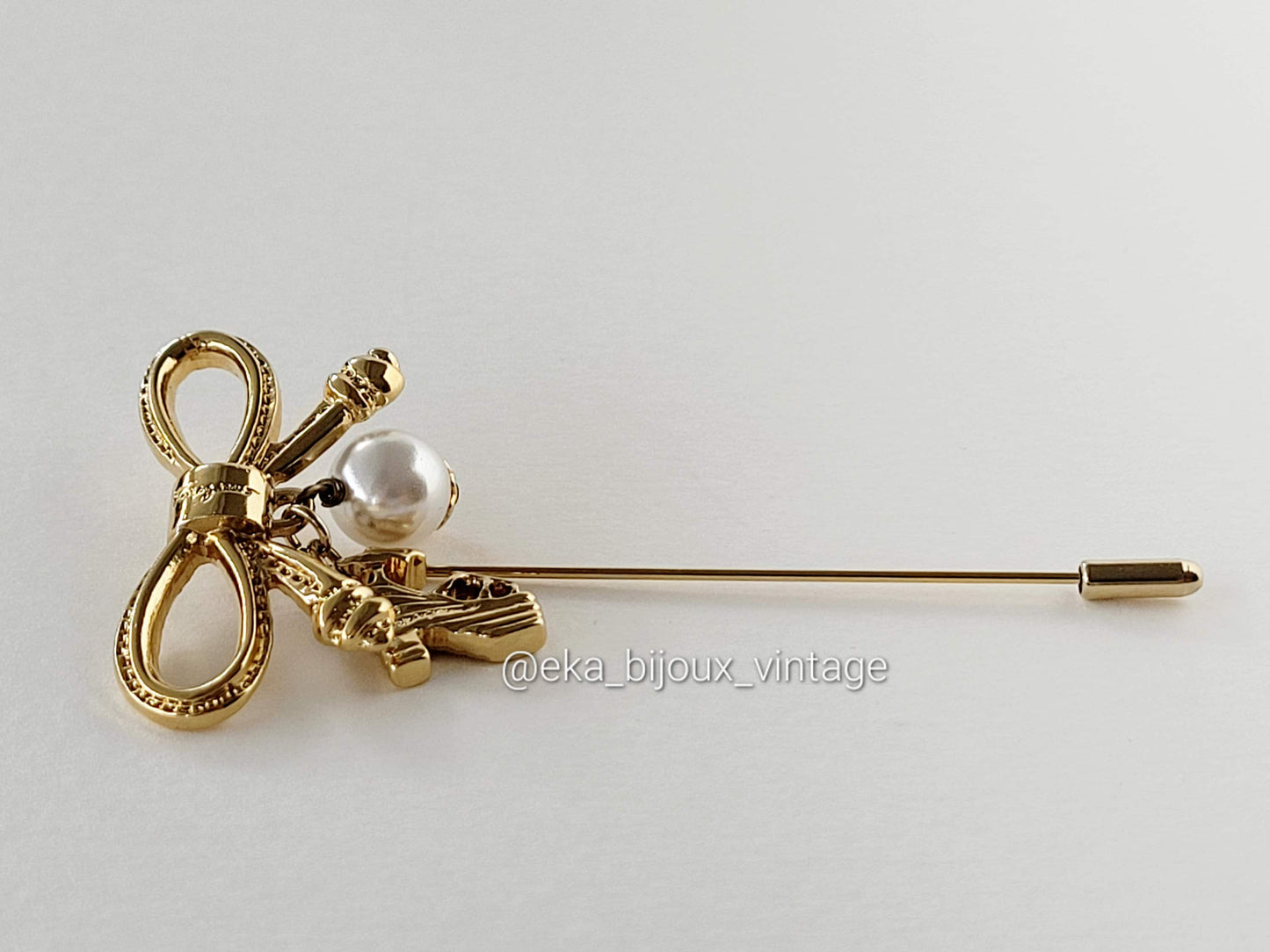 Ferragamo - Neud brooch/pin