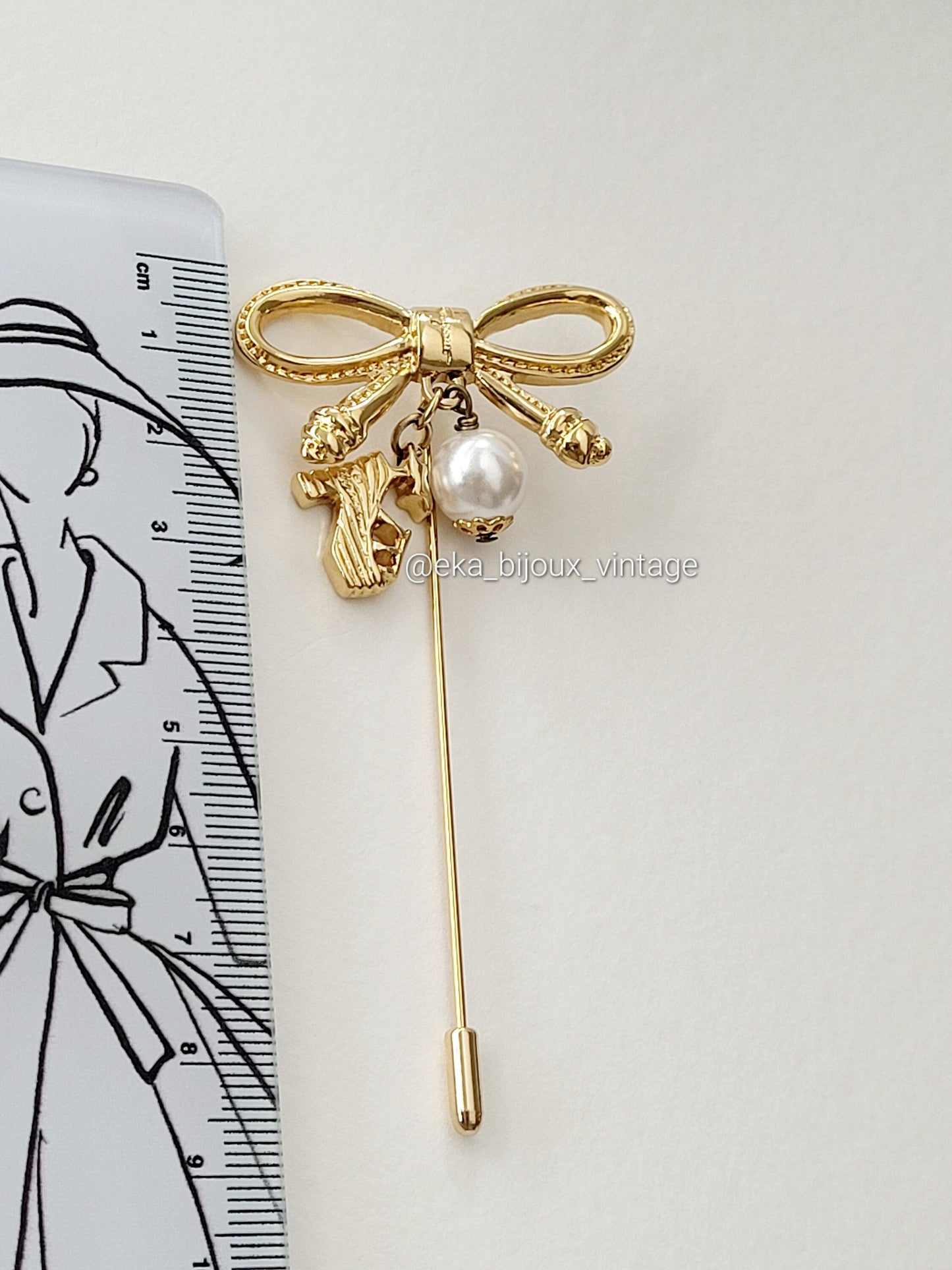 Ferragamo - Neud brooch/pin