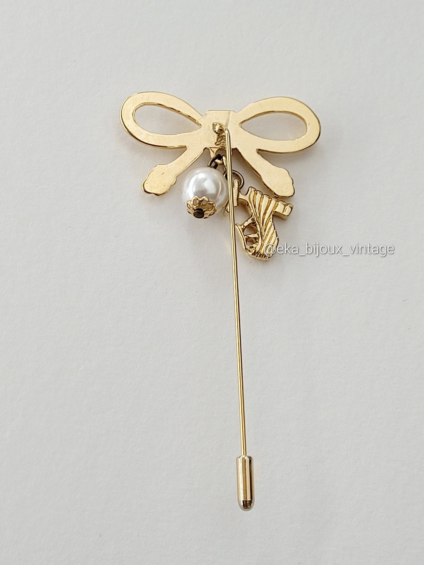 Ferragamo - Neud brooch/pin