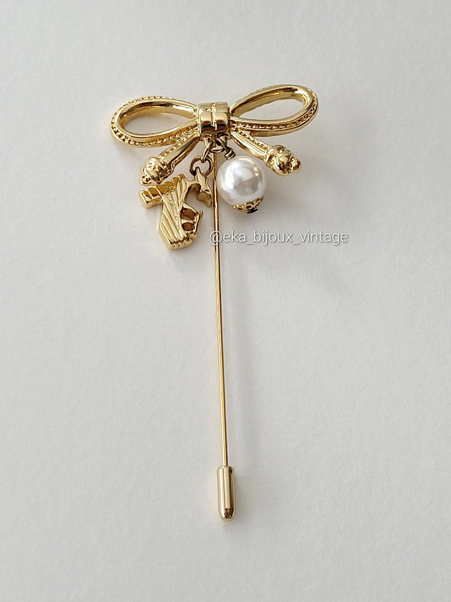 Ferragamo - Neud brooch/pin