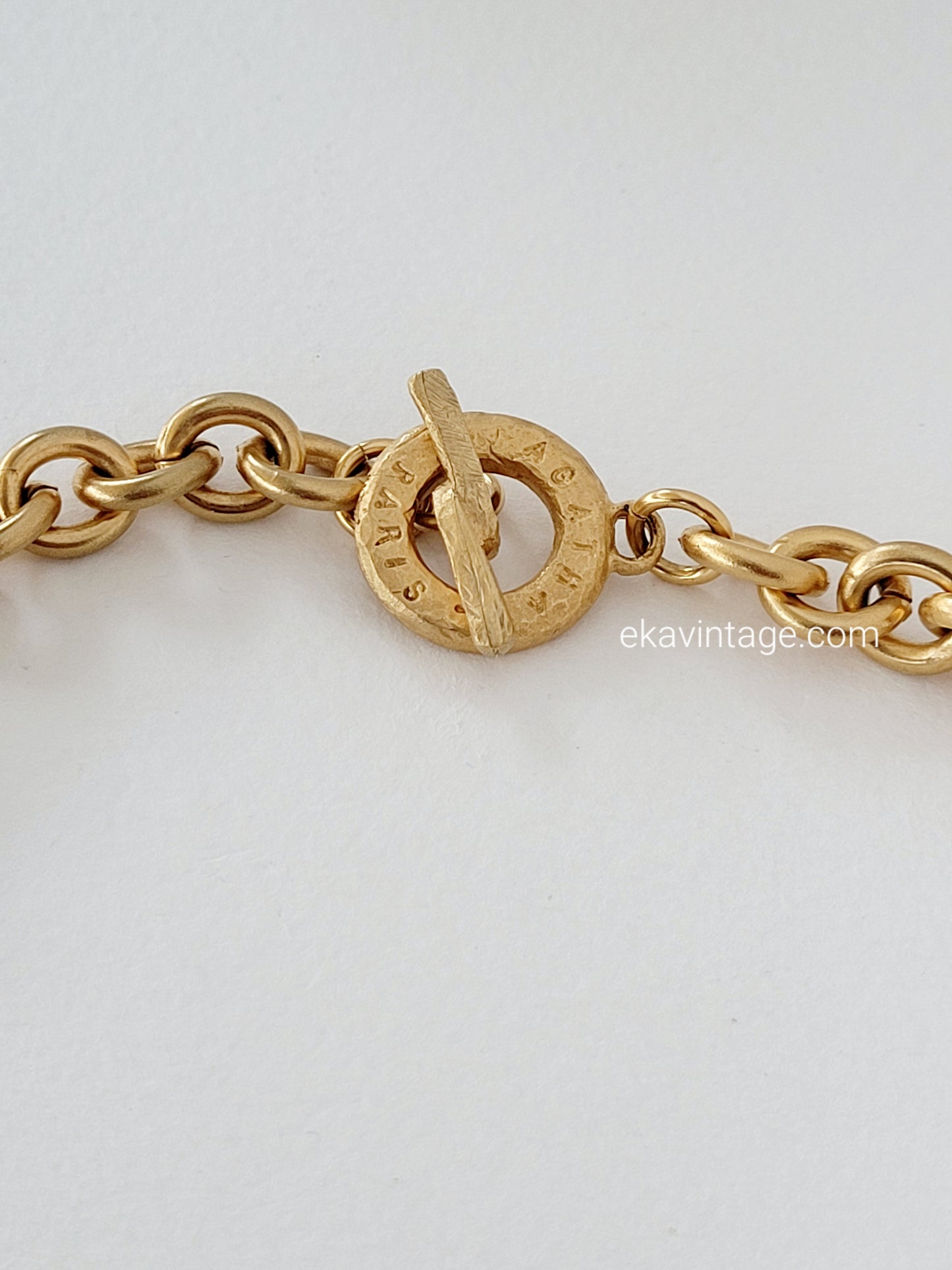 Agatha - Collier vintage sept breloques dorés